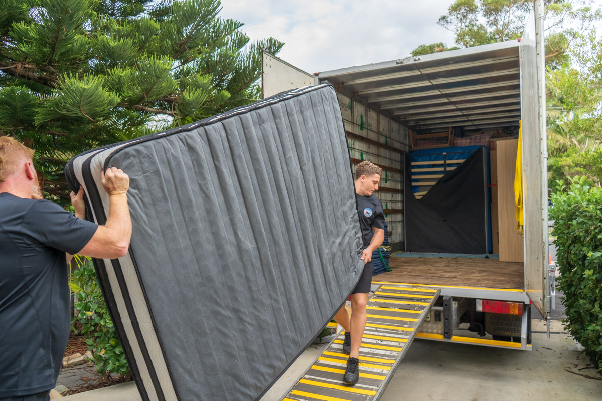 Local Dee Why movers transporting furniture securely in a moving truck